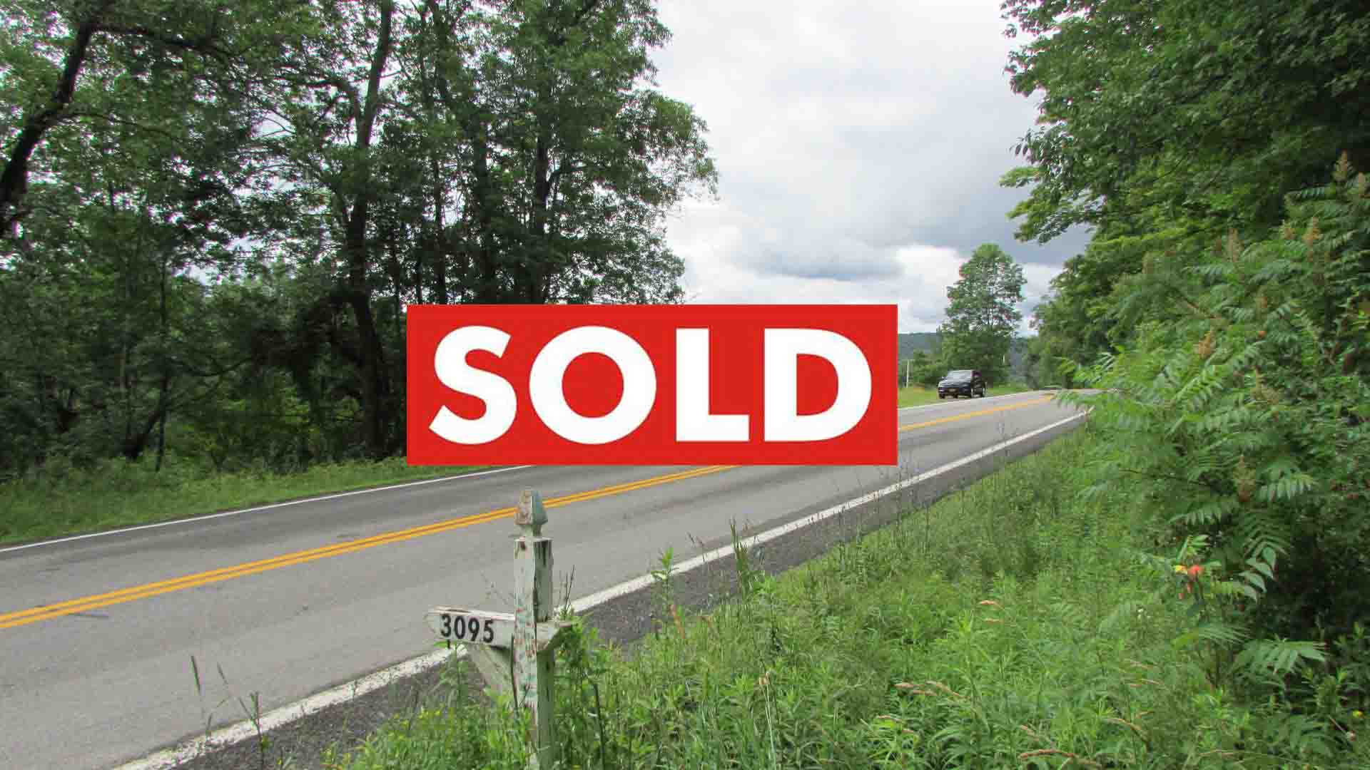“HAPPY TRAILS” 4.85 Happy Acres, Morris NY Otsego County, Mt views, D/W, Electric, Level & Wooded, RVs OK!! No town zoning. Only $21,900!